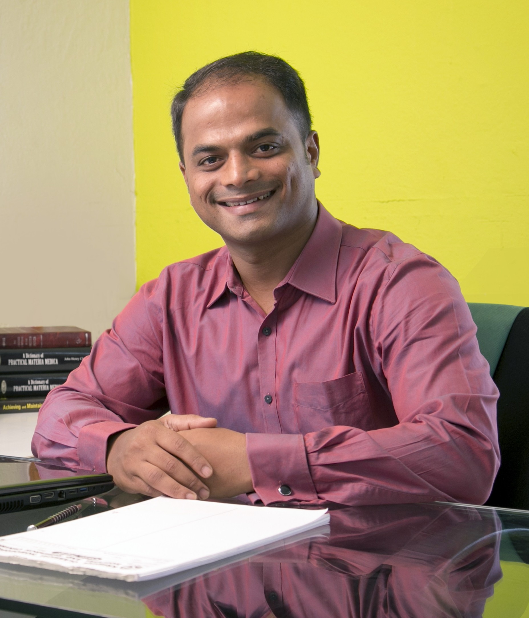 Dr. Vivek A. Mali